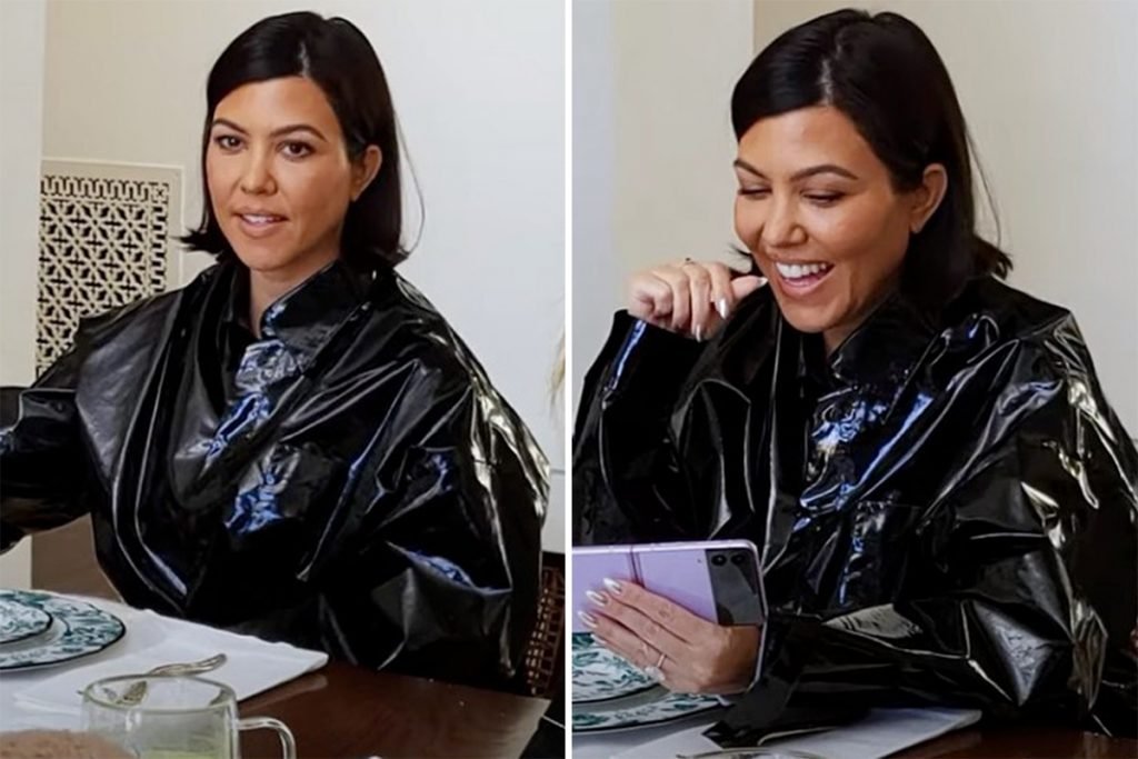 Kourtney Kardashian covers her stomach in oversized leather coat as fans think she’s pregnant with Travis Barker’s baby